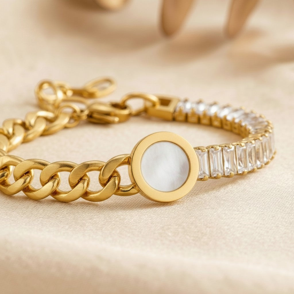 Złota Kraków gold-plated surgical steel bracelet with baguette-cut crystals and a round mother-of-pearl inlay.