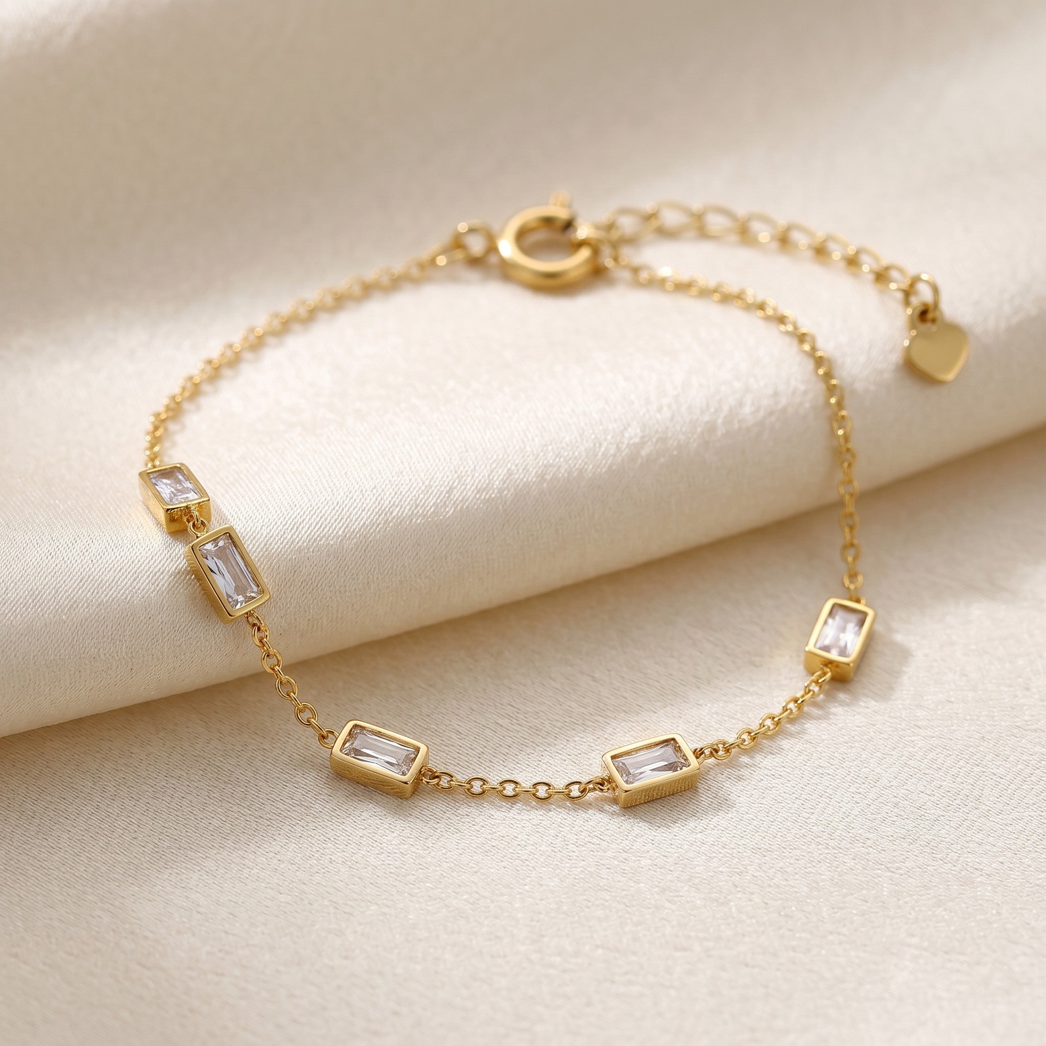 Złota Kraków gold-plated 18K surgical steel bracelet with rectangular clear crystals and adjustable clasp.