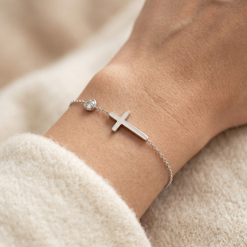 Złota Kraków silver-tone surgical steel bracelet with a cross charm and a clear crystal accent.