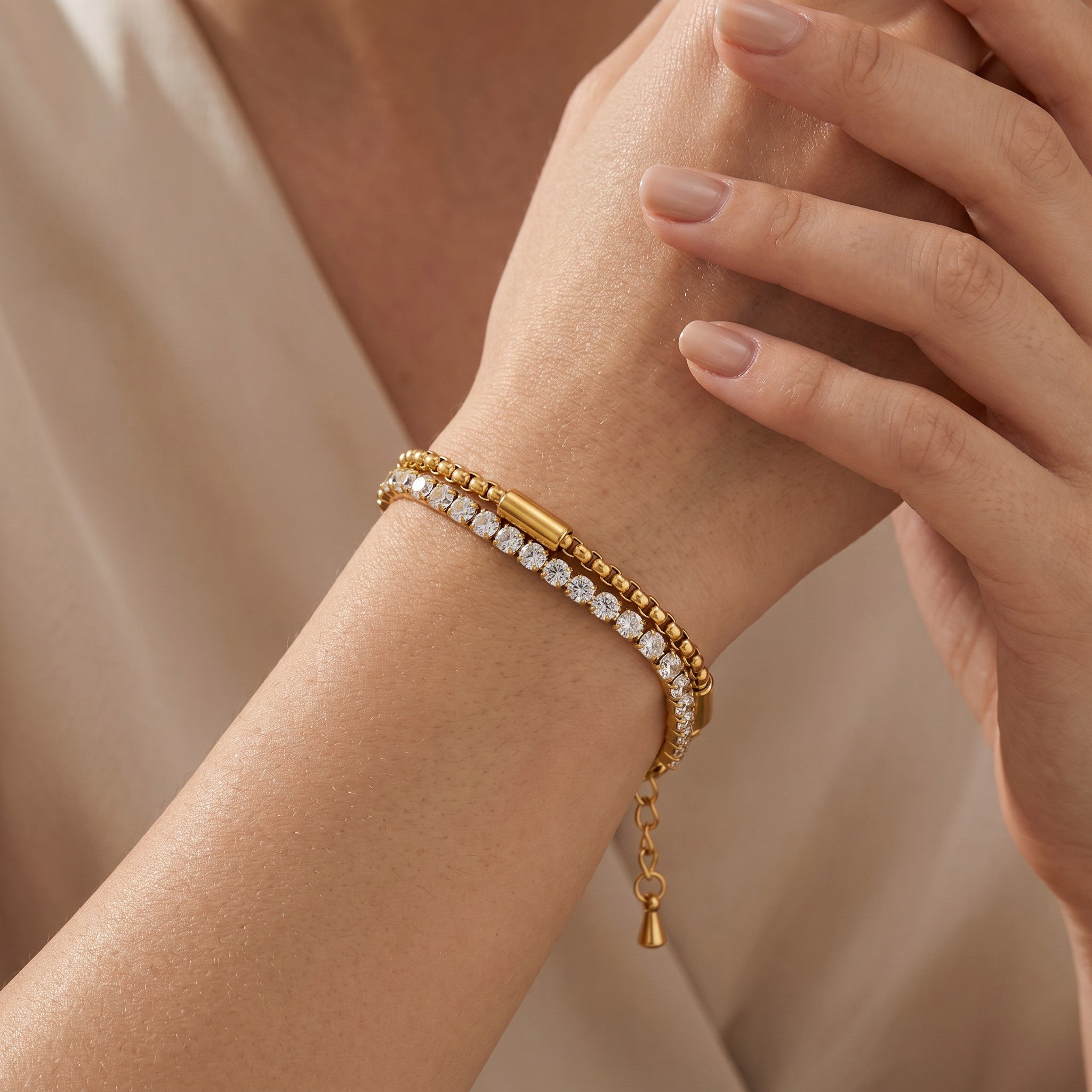 Złota Kraków double tennis bracelet with cubic zirconia and gold plated surgical steel, adjustable length.