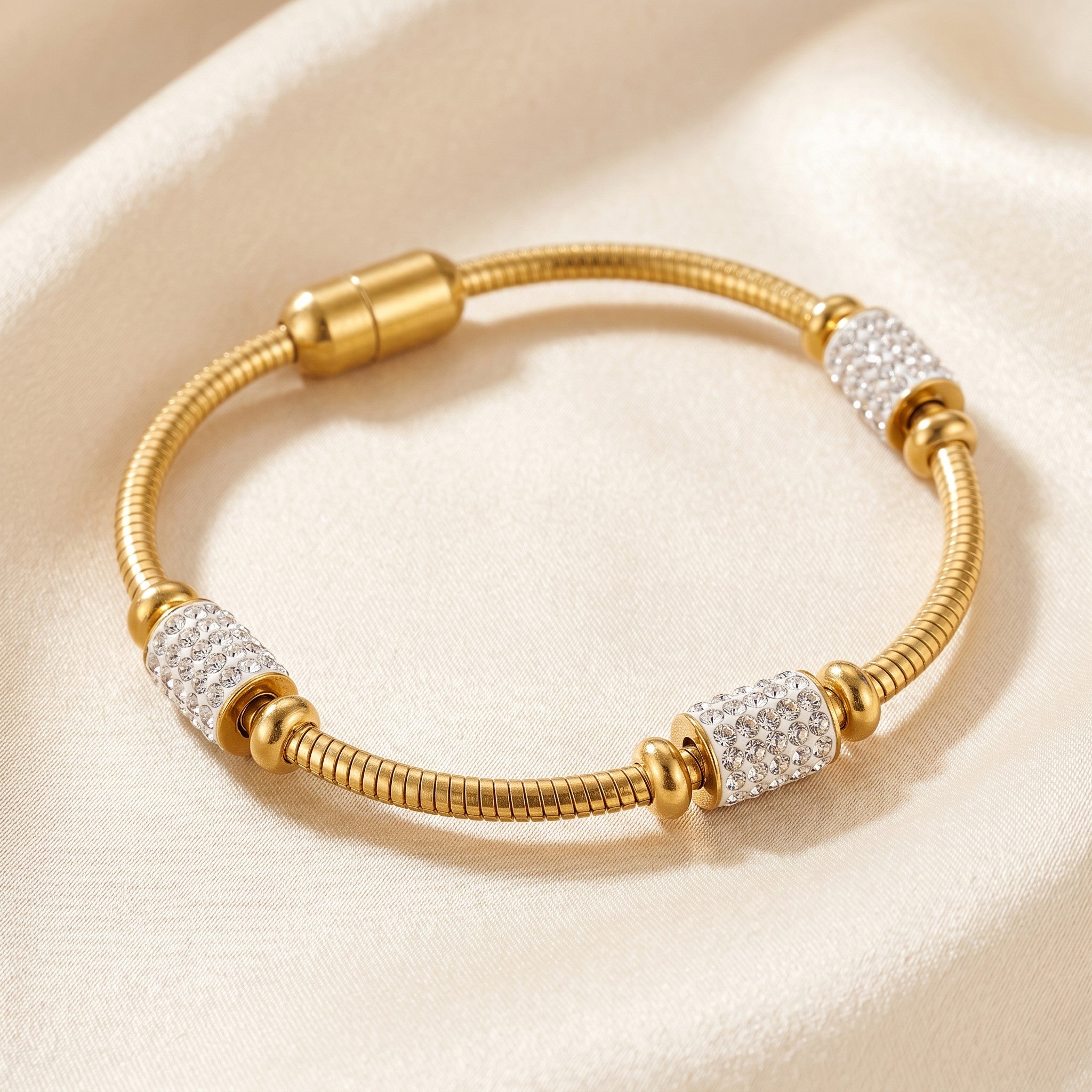Złota Kraków gold-plated surgical steel bracelet with crystal barrel charms and adjustable length.