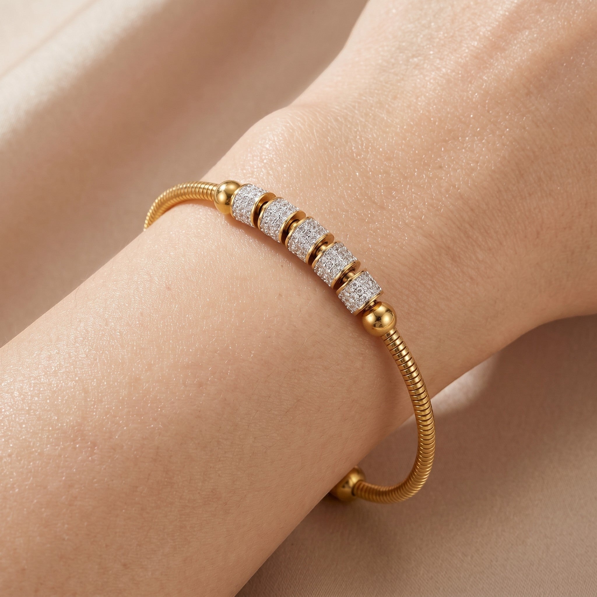 Złota Kraków gold-plated surgical steel bracelet with pave crystal beads and adjustable length.