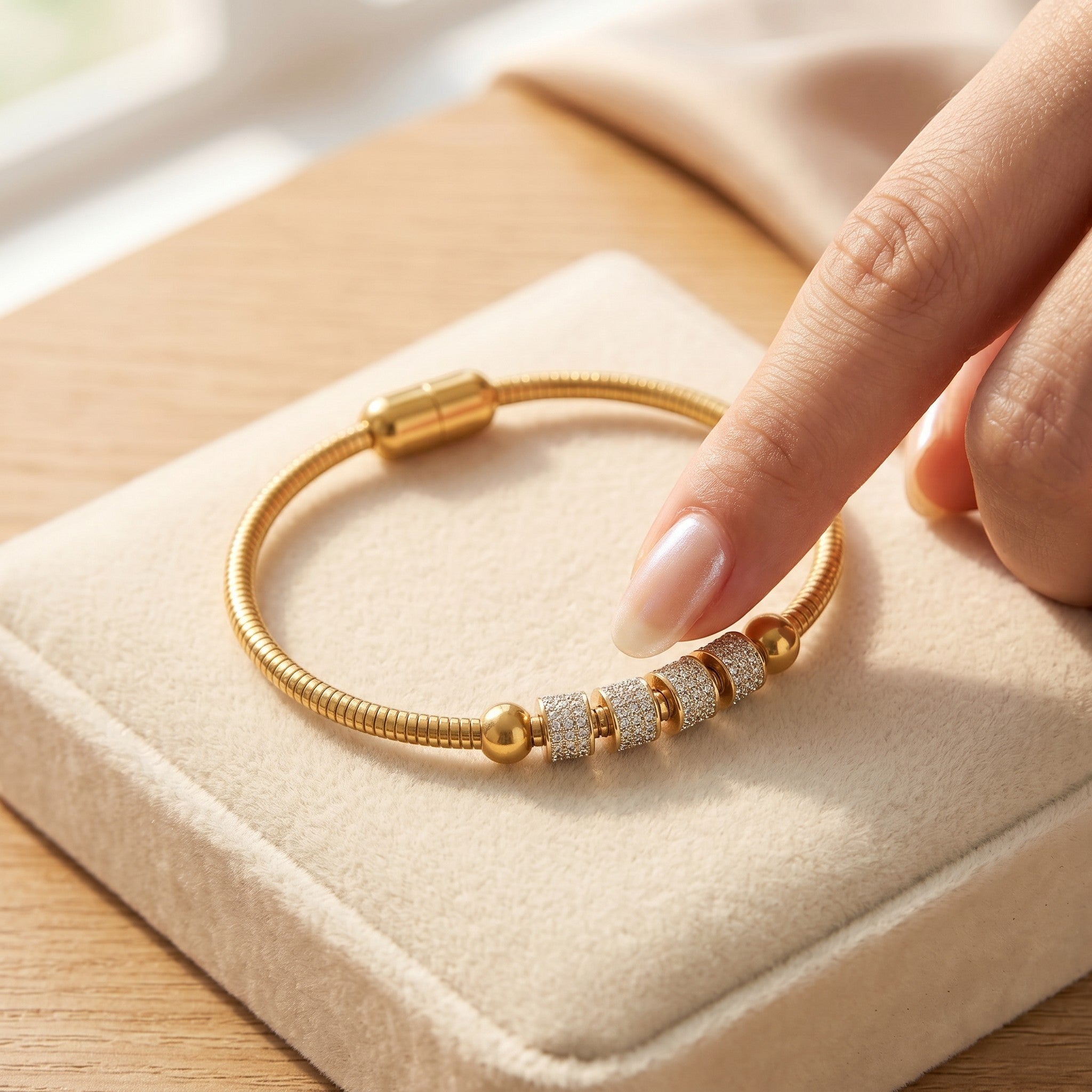 Złota Kraków gold-plated surgical steel bracelet with crystal-embellished beads and adjustable clasp.