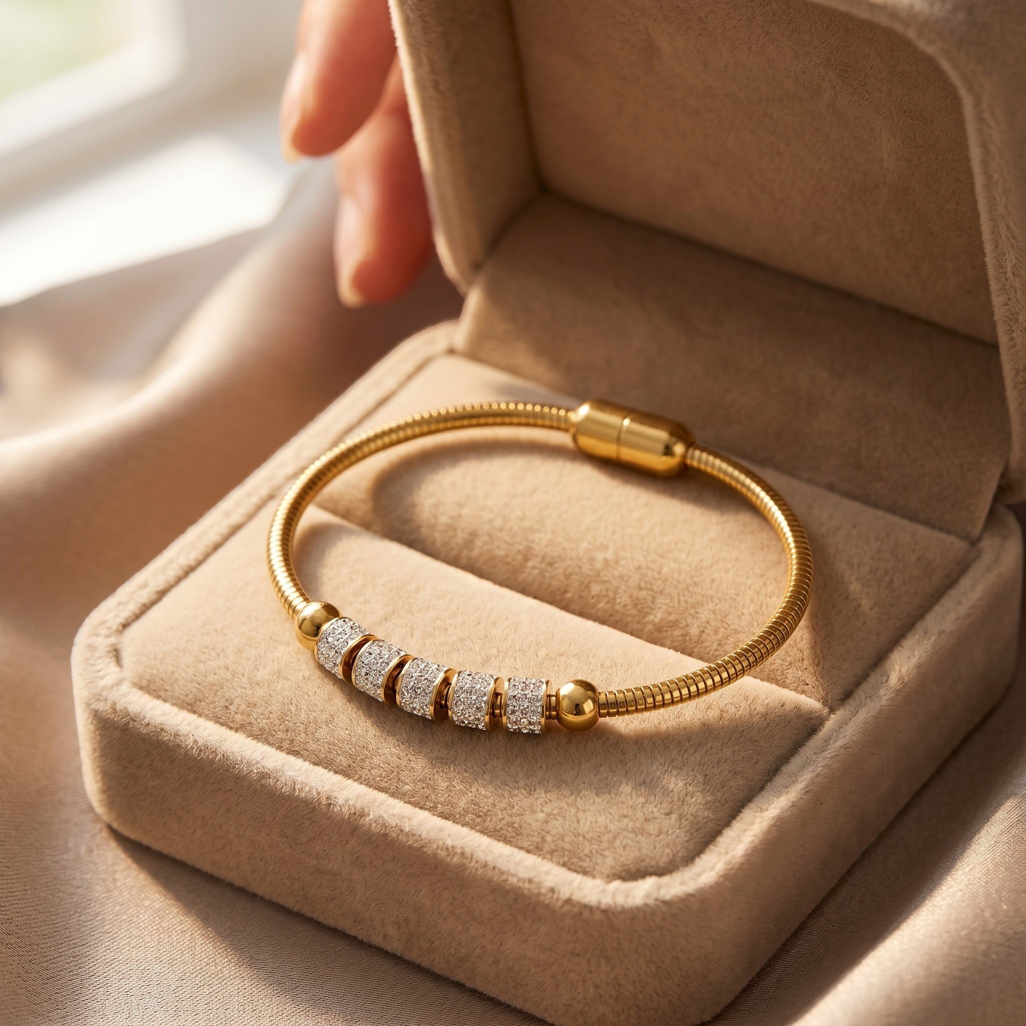 Złota Kraków gold-plated surgical steel bracelet with crystals and adjustable length, presented in a velvet box.