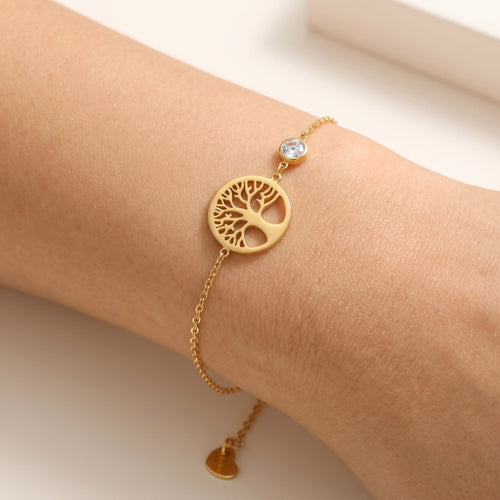 Złota Kraków gold-plated surgical steel bracelet with a tree of life charm and a clear crystal accent.